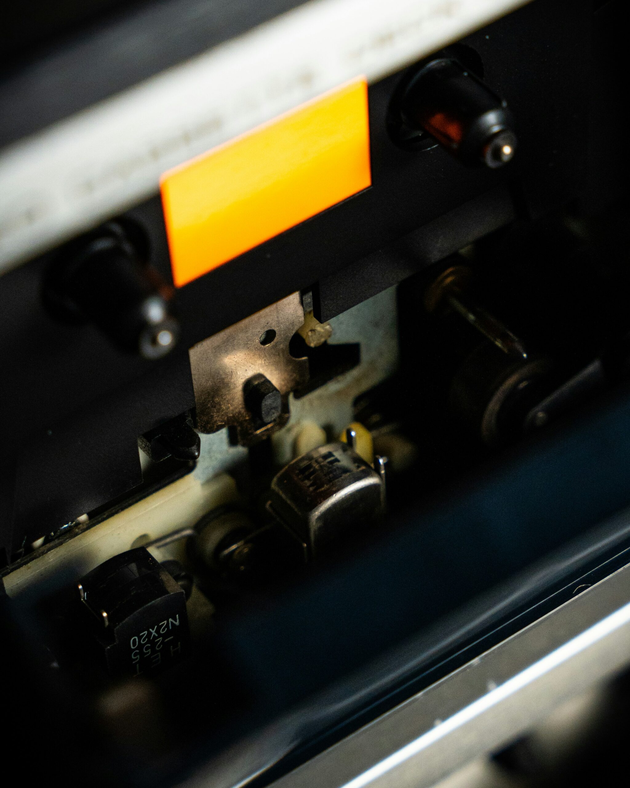 Close view of the playheads of a cassette tape player in a recording studio at Orbital 101 Studio.